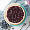 Shop Royal Kundan Rakhi with Blueberry Cheesecake