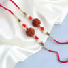 Gift Rudraksh Rakhi Set Of 2 With Red Velvet Cake (Half kg)
