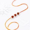 Buy Sacred Rudraksh Rakhi with Ferrero Rocher
