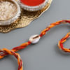 Seashell Zari And Moli Rakhi Online
