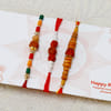 Buy Set of 3 Rakhis with 16 Pcs Ferrero Rocher Box & 250g Kaju Katli