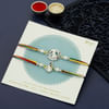 Buy Silver Coated Krishna Rakhis of Divinity Set of 2