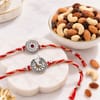 Silver-Plated Ganesh and Floral Rakhi Set with Dry Fruits Online