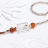 Silver-Plated Peacock Feather Rakhi Online
