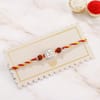 Gift Silver Plated Swastik & Peacock Feather Rakhi Set