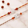 Shop Silver Plated Swastik & Peacock Feather Rakhi Set