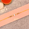 Gift Stone Rakhi with Golden Beads