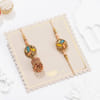 Buy Temple Shaped Bhaiya Bhabhi Rakhi with Beads Work