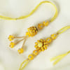 Yellow Pachhi Designed Bhaiya Bhabhi Rakhi with Kadi Kundan Work Online