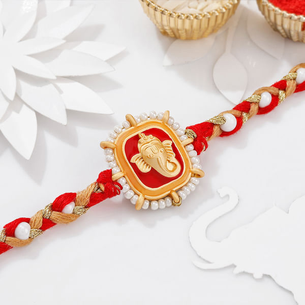 Auspicious Pearl And Meena Work Ganesha Rakhi