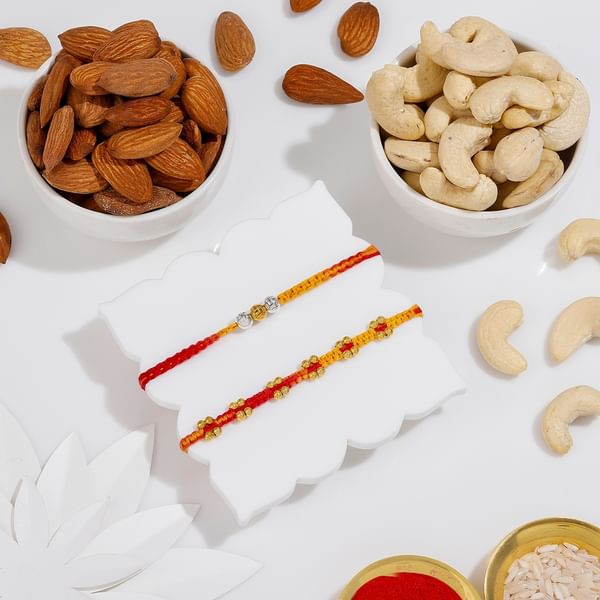 Auspicious Rakhi And Dry Fruits Combo