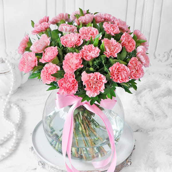 Bouquet of Light Pink Carnations in Globe Vase (25 stems)