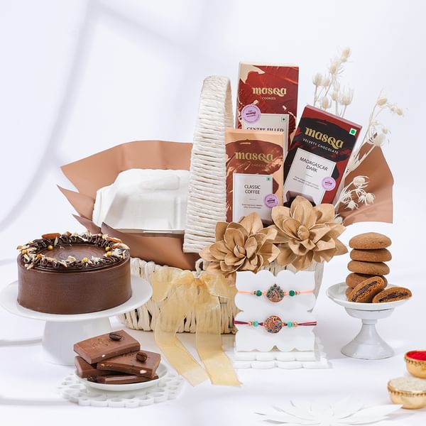 Decadent Delights And Peacock Rakhis Hamper