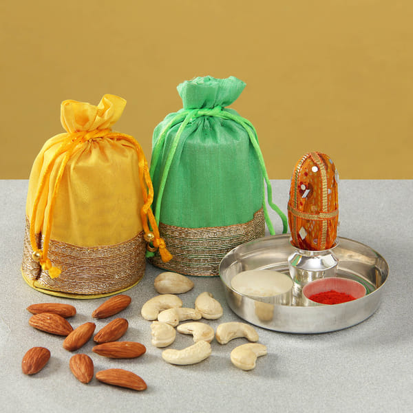 Dry Fruits in Designer Potlis with Silver Plated Puja Thali