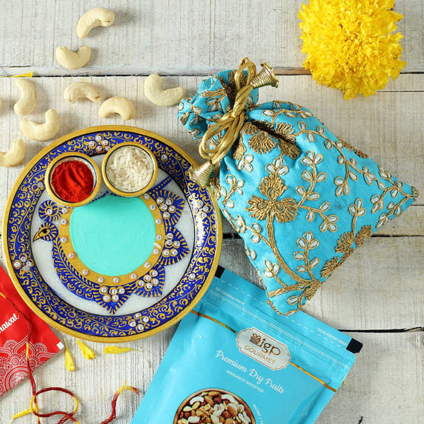 Dry Fruits Potli with Decorative Marble Puja Thali