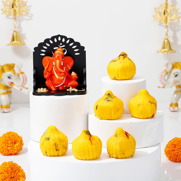 Ecstatic Ganesha Statue And Kesar Pista Modak Combo
