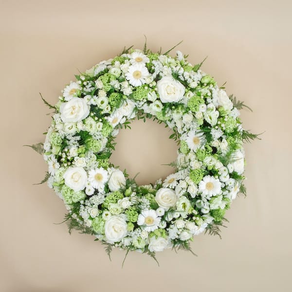 Funeral wreath with roses and gerberas