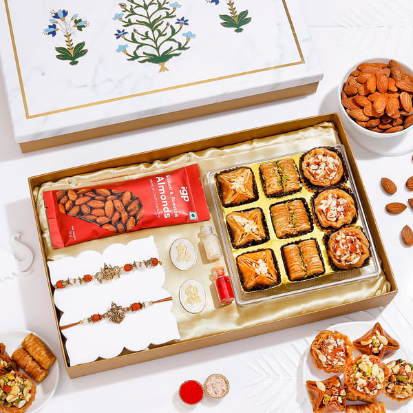 Ganesha And Lakshmi Bhaiya Bhabhi Rakhi Hamper With Silver Coins