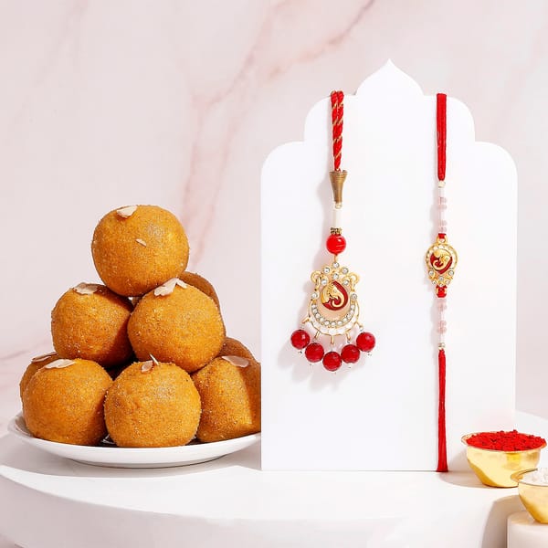 Ganesha Bhaiya Bhabhi Rakhi Set with Besan Laddoo