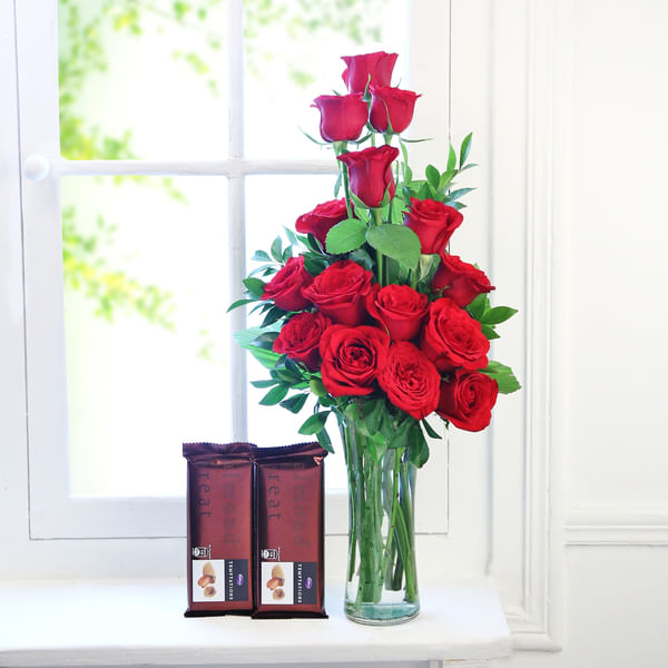 Glass Vase with 15 Red Roses & Bars of Cadbury Temptation