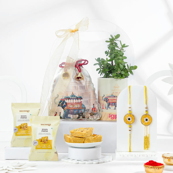 Golden Glow Evil Eye Bhaiya Bhabhi Rakhi Hamper