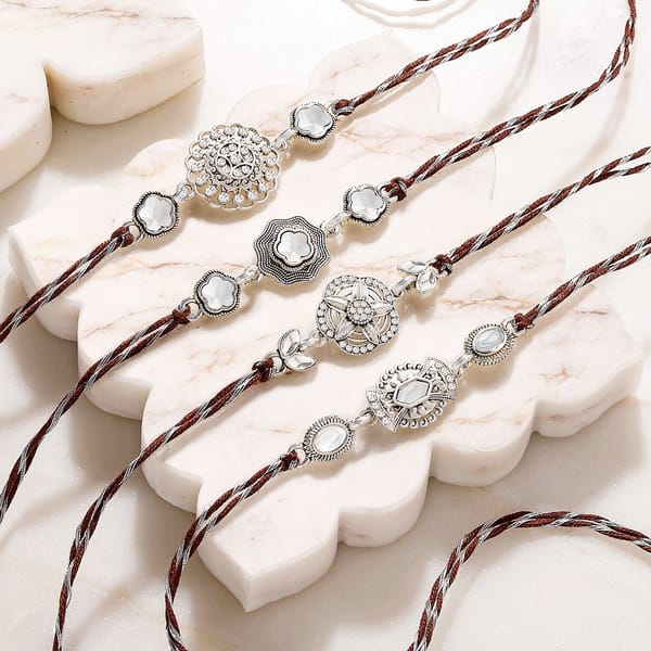 Handcrafted Silver Charm Rakhi Set of 4