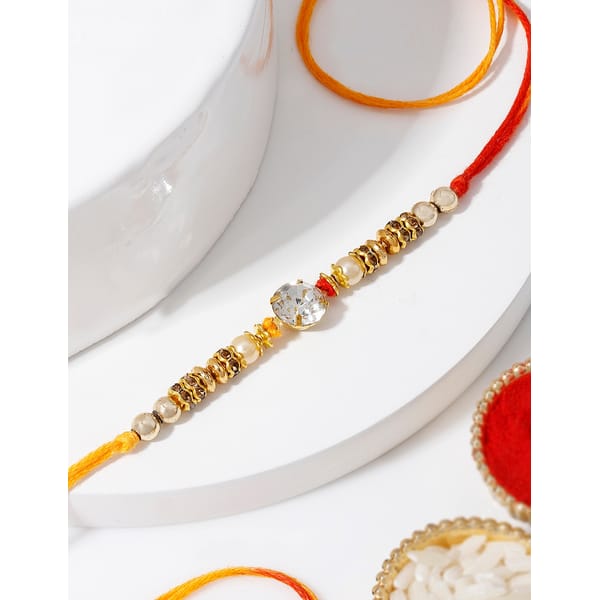 IGP Stone Rakhi with Golden Beads