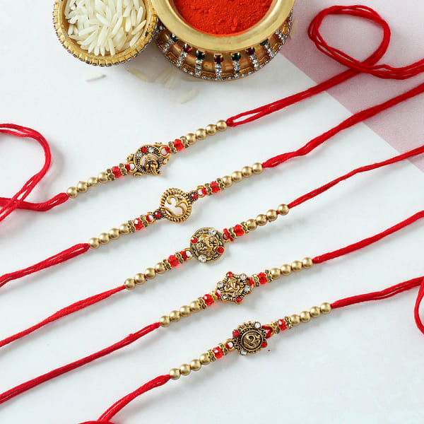 Om & Ganesha Metal Rakhi with CZ Stones