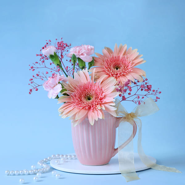 Peach and Pink Flowers in a Mug