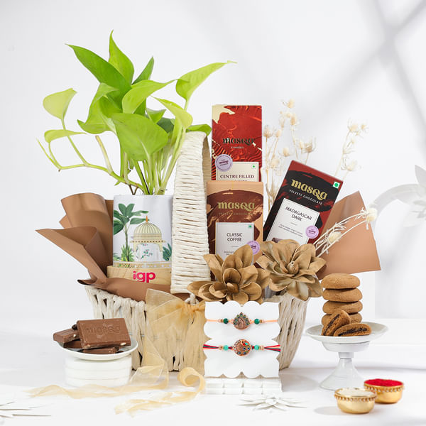 Peacock Rakhi And Chocolate Bliss Hamper