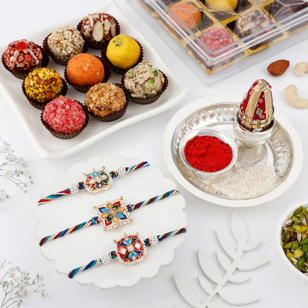 Pearl And Meena Work Rakhi Set Of 3 With Assorted Laddoos