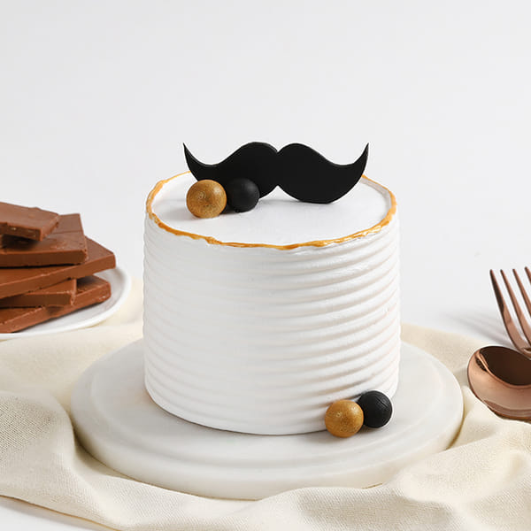Pearly Moustache Cake