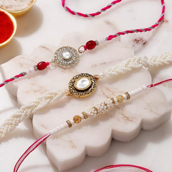 Regal Kundan Pearl and Vintage Golden Rakhi - Set of 3
