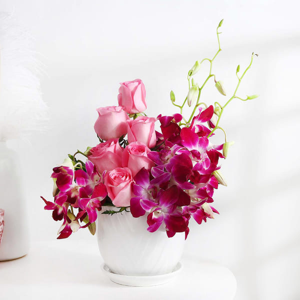 Roses and Orchid Bloom Arrangement
