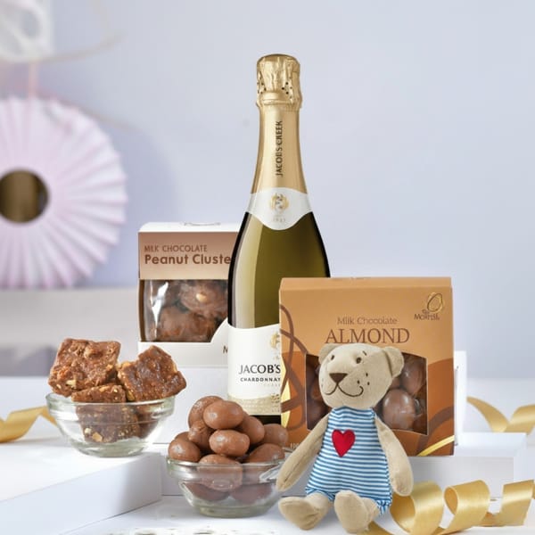 Sparkling Wine, Chocolates, And Teddy Gift Hamper