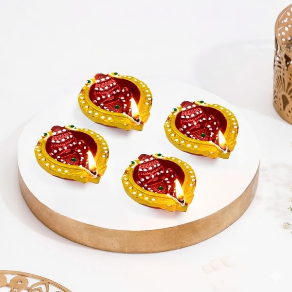 Vibrant Shankh-Shaped Diyas ï¿½ Set Of 4