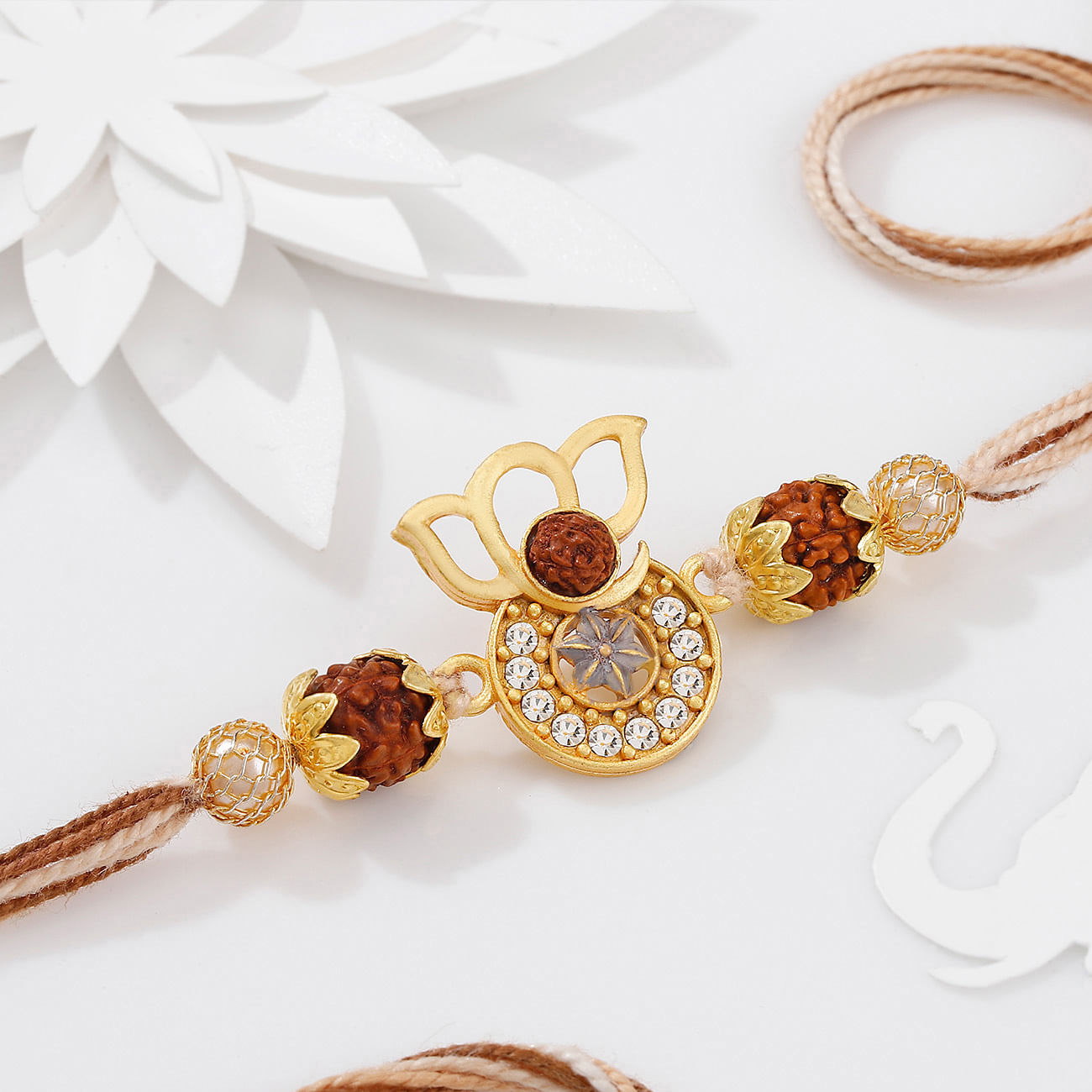 Auspicious Ganesha Rudraksha Rakhi With CZ Stones