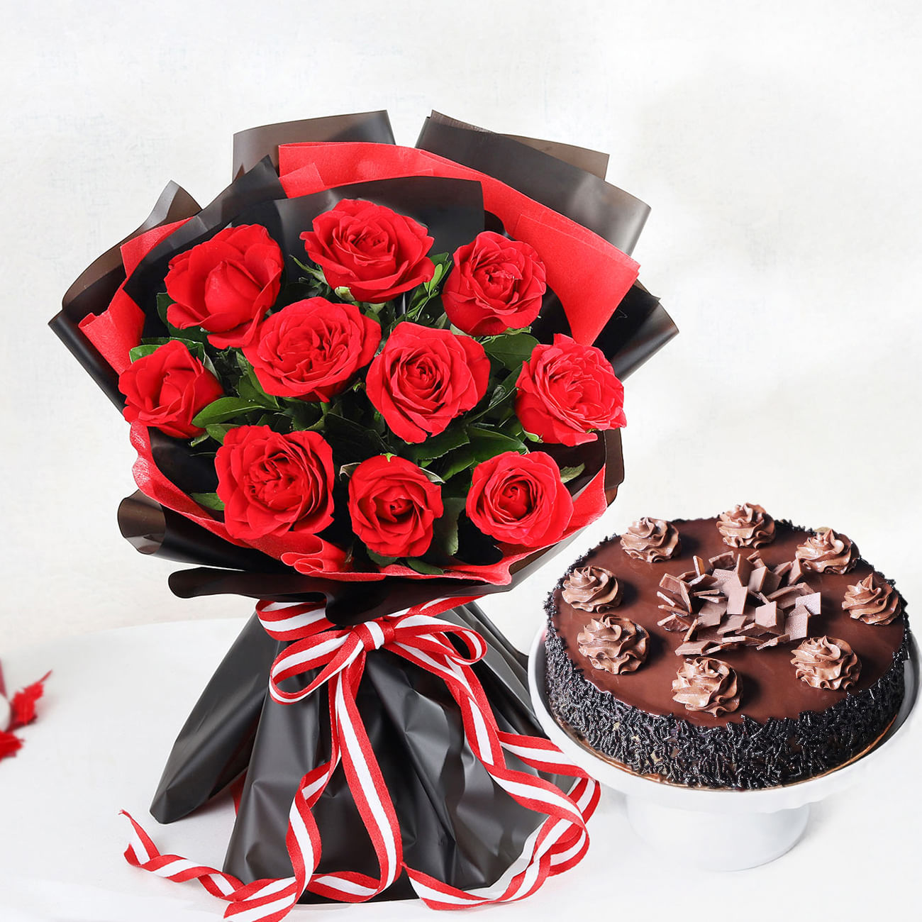 Decadent Chocolate Truffle Cake And Red Roses Bouquet Combo