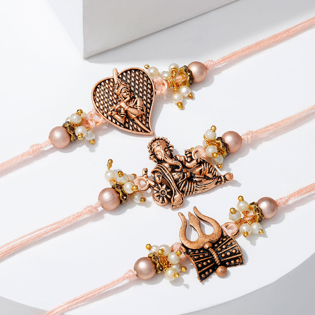 Divine Antique Pearl Rakhi (Set of 3)