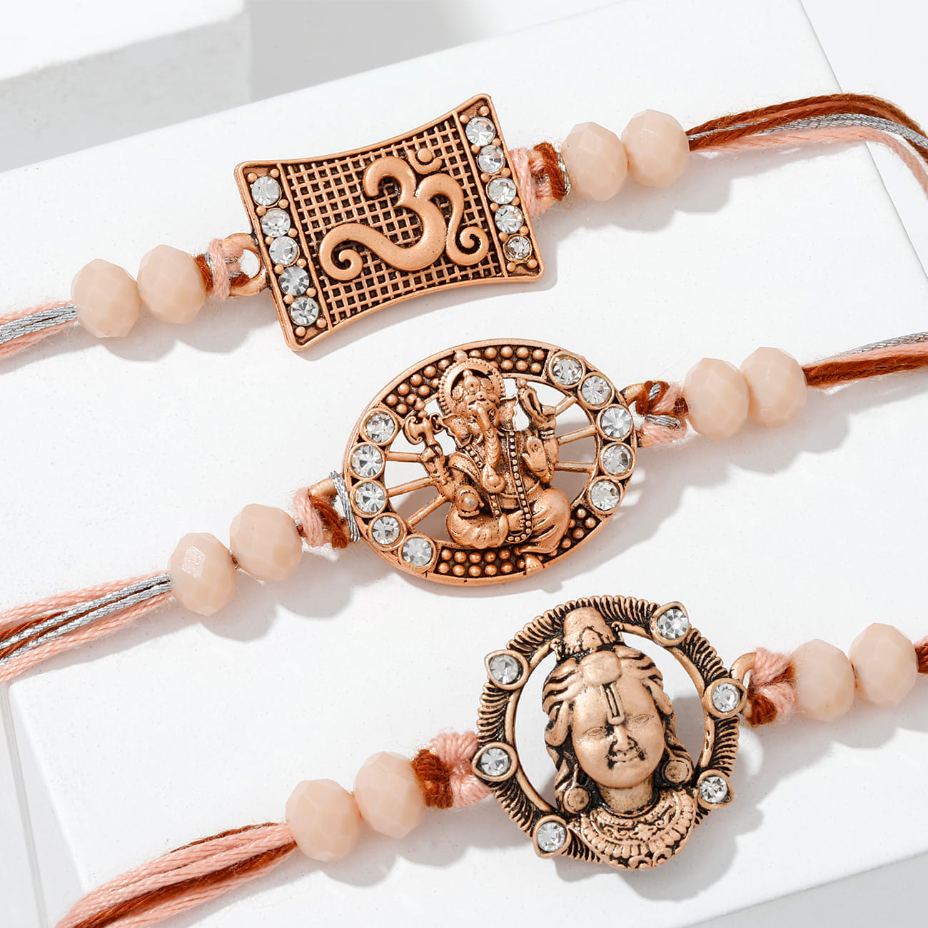 Divine Antique Pearl Rakhi (Set of 3)