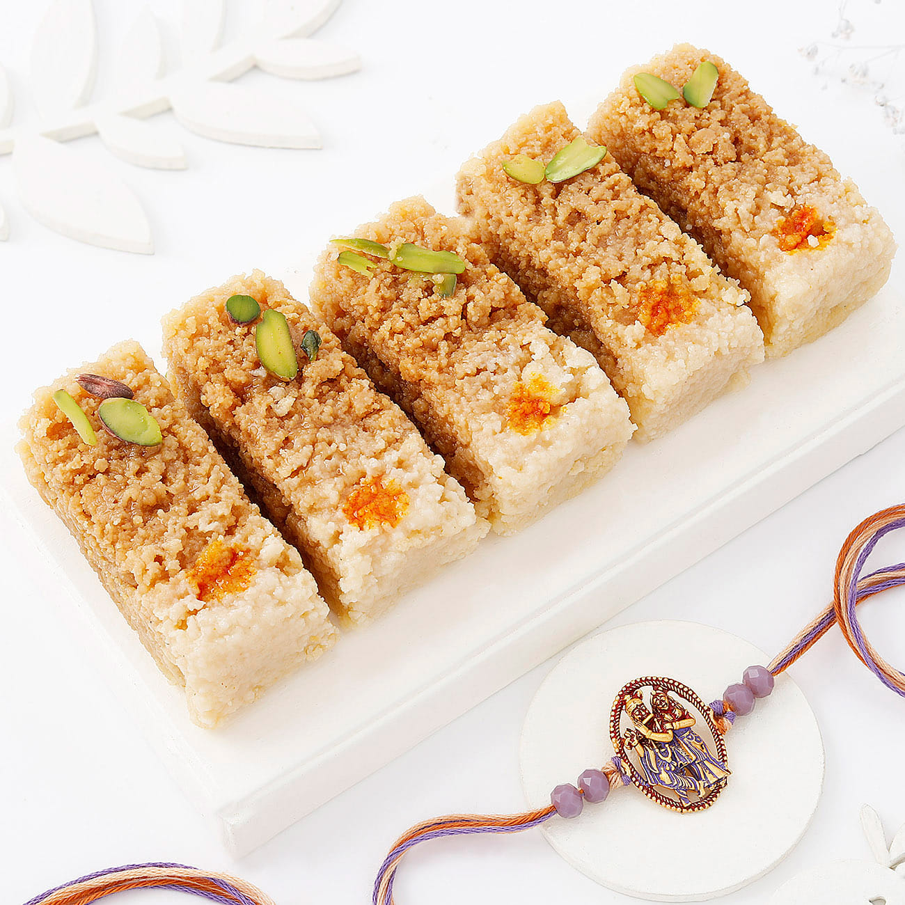 Divine Radha Krishna Rakhi And Delectable Sweets