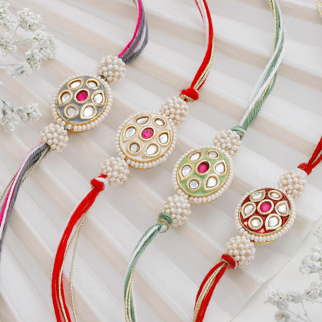 Fancy Pearl And Kundan Rakhi Set Of 4