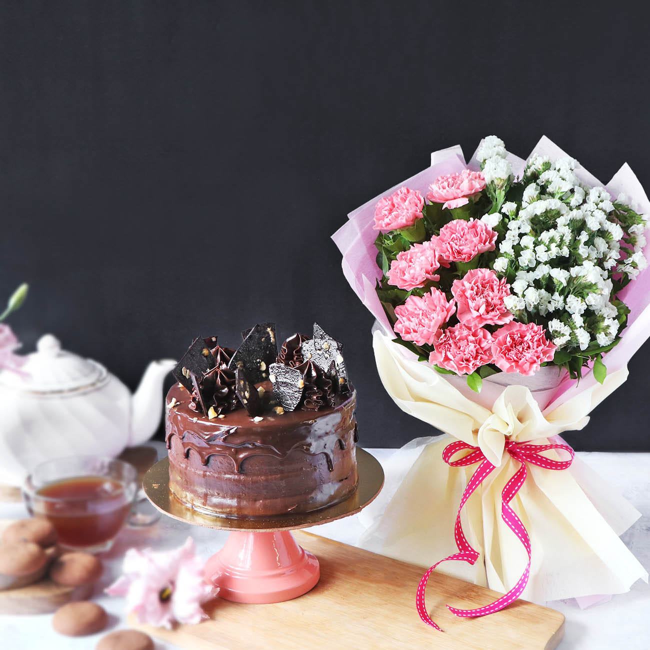 Hazelnut Crunch Cake With Bunch Of Light Carnations