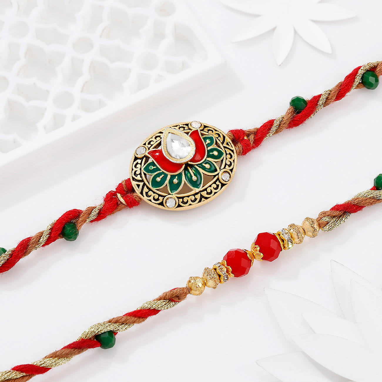 Kundan Lotus Braided Rakhis - Set Of 2
