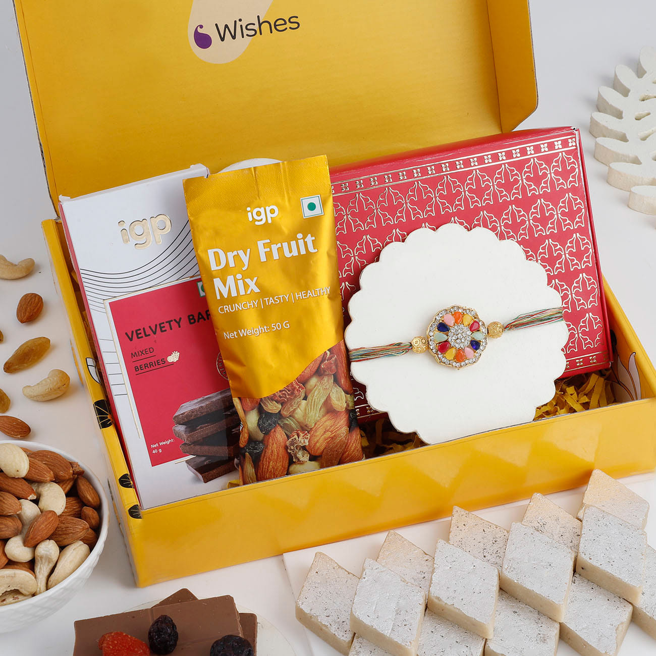 Navratan Stone Rakhi And Indulgent Delights Hamper
