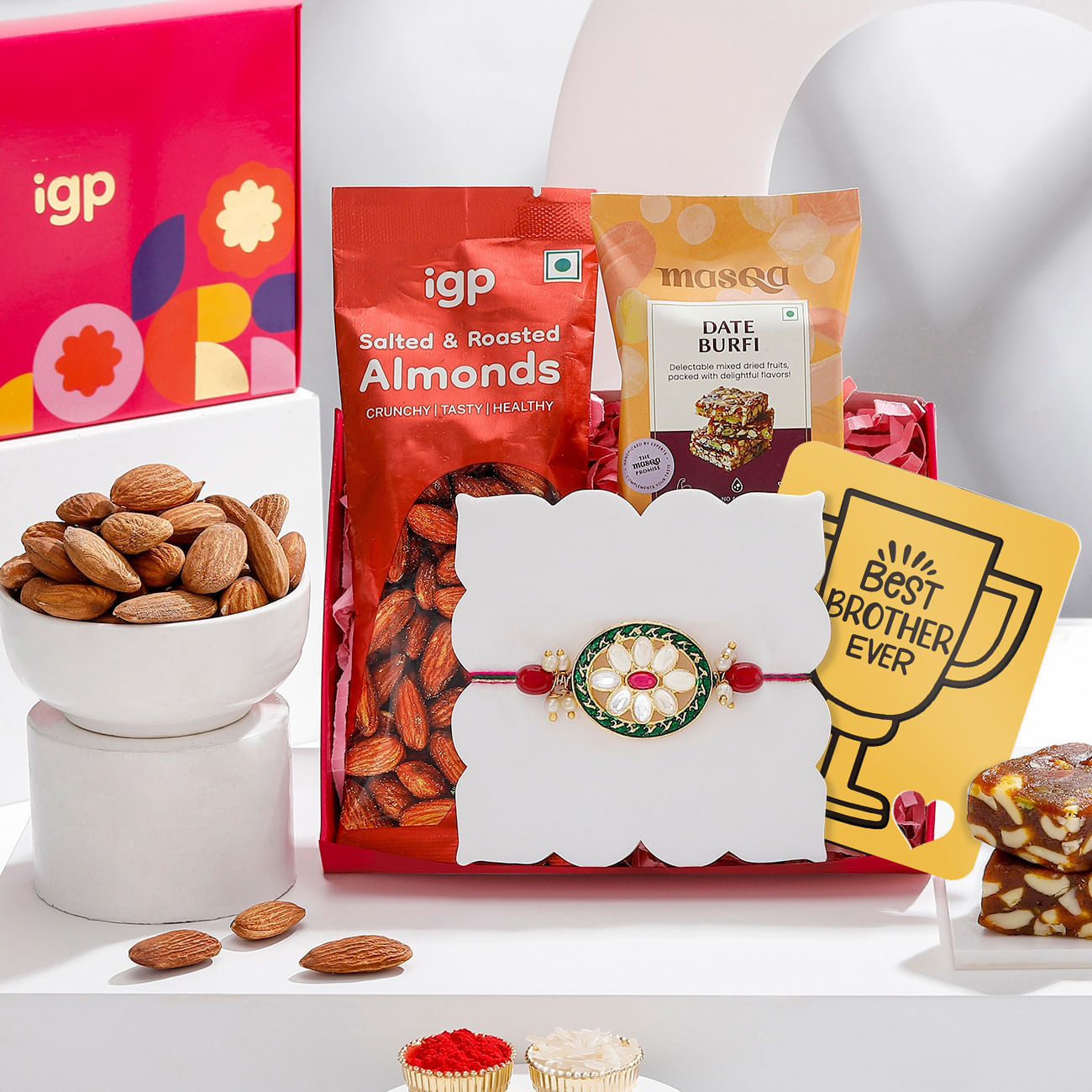 Oval Kundan Rakhi And Dry Fruits Combo