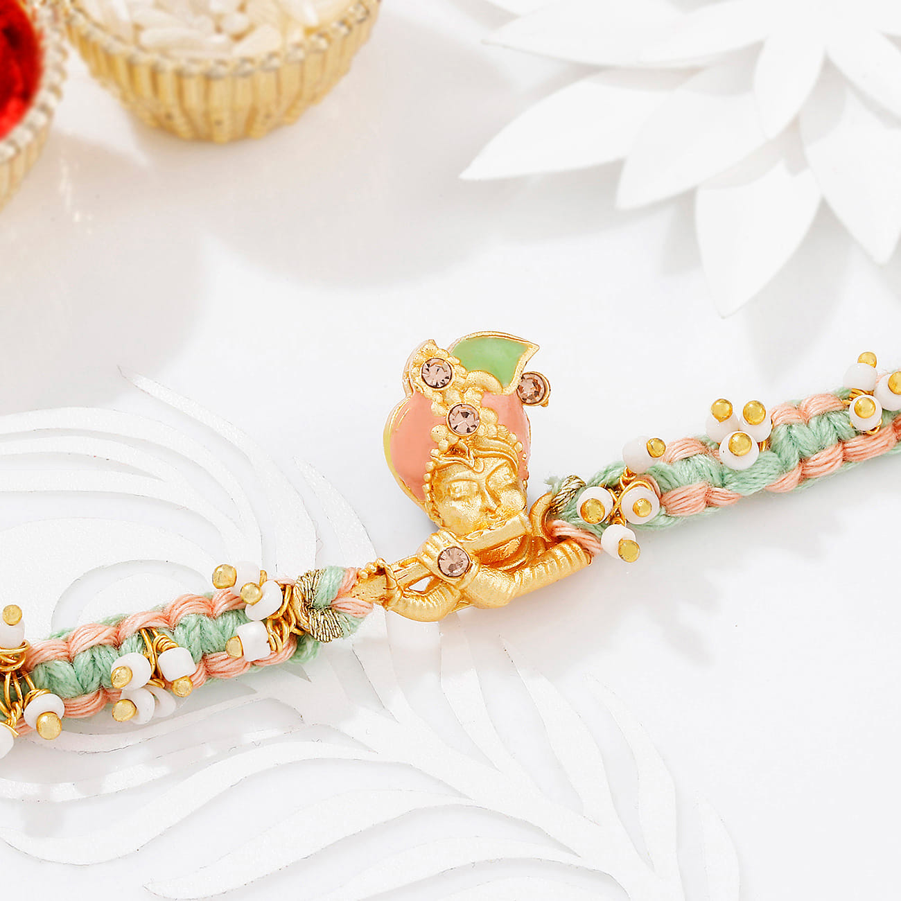 Pastel Krishna Macrame Rakhi With Meena Work
