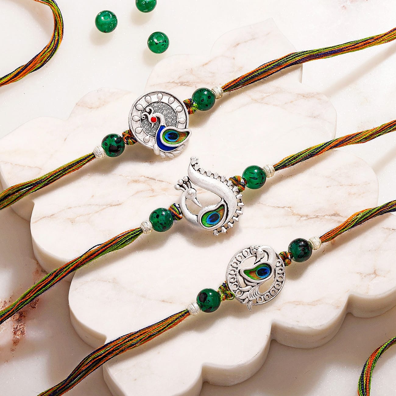 Peacock Silver-Plated Designer Rakhi Set of 3