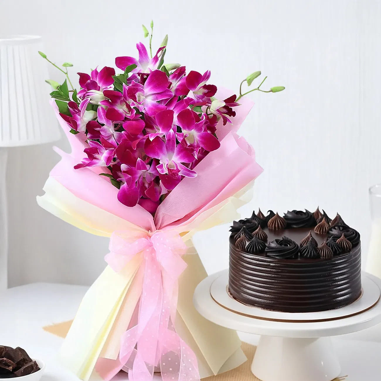 Purple Orchid Bouquet And Dutch Truffle Cake Gift Combo