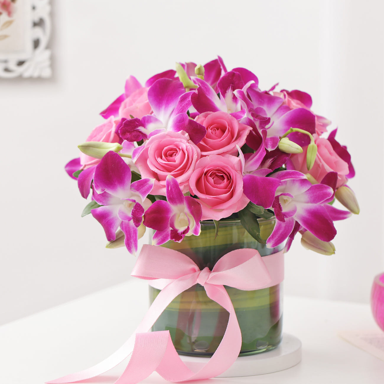Purple Orchids & Pink Roses In Round Vase